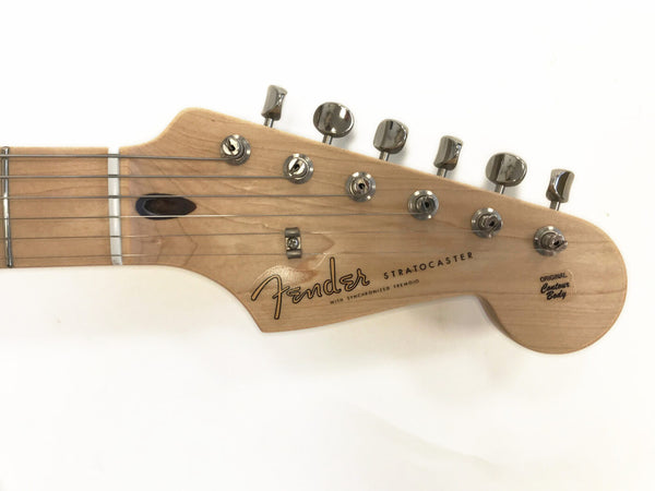 Fender Stratocaster guitar headstock with chrome tuning pegs and original contour body logo on natural wood finish
