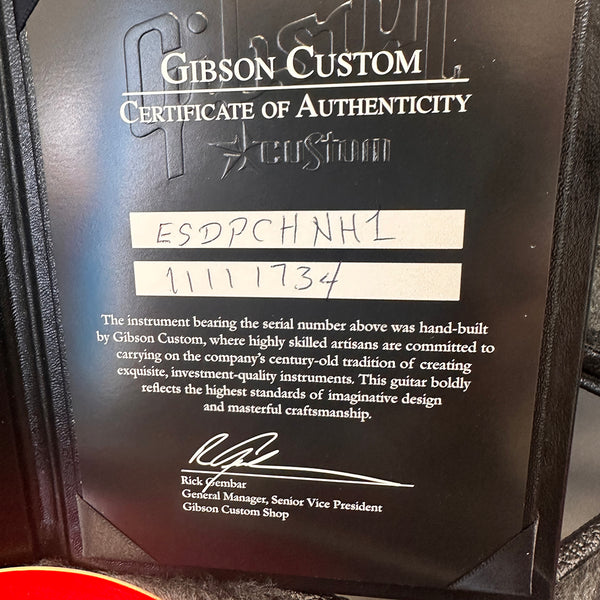Gibson Custom Certificate of Authenticity showing serial number ESDPCHNH1 11111734, signed by Rick Gembar, General Manager and Senior Vice President of Gibson Custom Shop.