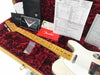 Fender Custom Shop 2017 LTD JR Twisted Telecaster electric guitar in white with maple neck and fretboard, displayed inside a red velvet-lined hard case with Fender Custom Shop black leather warranty card holder, owner's manual, inspection sheet, Fender Custom Shop document, and small plastic bag with guitar parts.