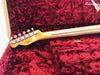 Fender Custom Shop Limited Edition electric guitar maple neck with vintage tuners resting in red plush lined guitar case