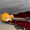 Gibson Les Paul electric guitar with sunburst finish in open black hard case with red velvet interior