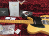 1951 Fender Nocaster Relic electric guitar with maple fretboard and black pickguard displayed in red velvet case with Fender Custom Shop certificate of authenticity and accessories