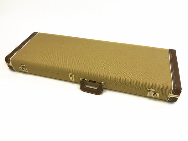 Rectangular vintage-style tweed guitar case with brown leather corners and handle, premium protective hard shell for electric guitar.