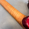 Close-up of flamed maple wood neck on guitar with deep cherry red glossy finish edge from Coffee House Guitars
