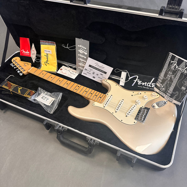 Fender Stratocaster electric guitar with maple neck in metallic pearl finish inside black hardshell case with Fender accessories and owner's manual
