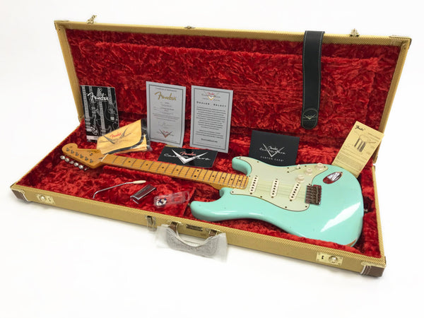 Fender Custom Shop vintage-style seafoam green electric guitar with maple neck in tweed hard case with red plush interior and Fender accessories and certificates