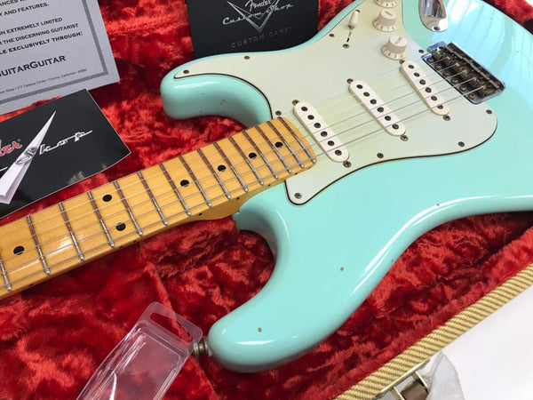 Fender Custom Shop vintage light blue Stratocaster electric guitar with maple neck and white pickguard in red plush-lined guitar case with Fender Custom Shop certificates and care booklet.