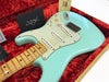 Fender Custom Shop vintage surf green electric guitar with maple neck and white pickguard in red plush-lined guitar case with Fender Custom Shop documentation