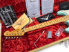 Fender Custom Shop 1959 Stratocaster guitar headstock and maple fretboard in tweed hard case with red plush lining, Fender Custom Shop cleaning cloth, whammy bar, and authenticity certificates.