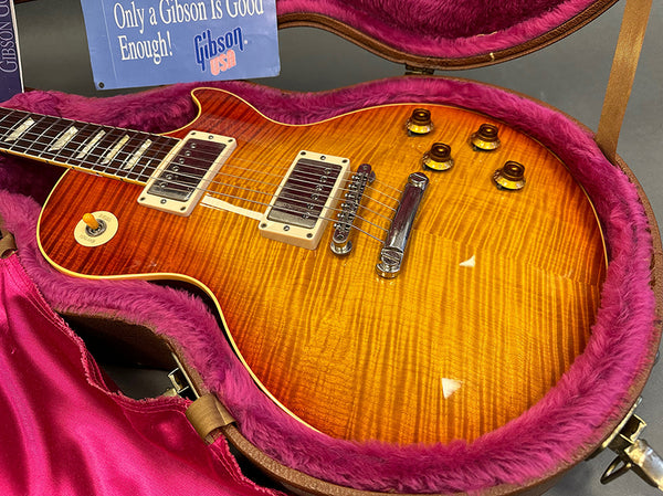 Gibson Les Paul electric guitar with sunburst flame maple top in a pink plush-lined hardshell case