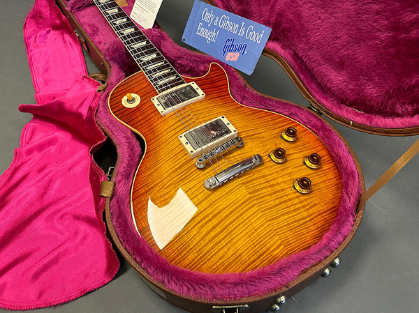 Gibson Les Paul electric guitar with sunburst finish in pink plush-lined hardshell case and Gibson USA tag