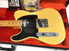Vintage Fender Telecaster electric guitar with maple neck and black pickguard in orange plush-lined hard case