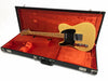 Fender Telecaster electric guitar with black pickguard in open black hard case lined with red velvet interior