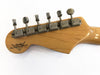 Vintage Fender Custom Shop guitar headstock with six vintage tuning pegs and natural wood finish