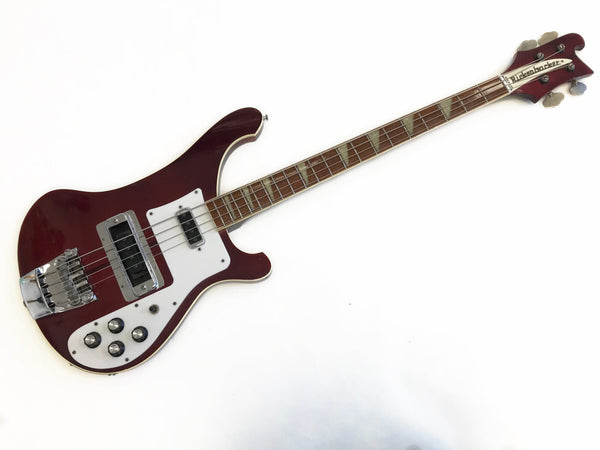 Rickenbacker electric bass guitar in dark red finish with white pickguard and vintage tuning pegs on white background