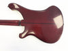 Back view of a vintage maroon electric guitar body with a double cutaway design and a dark center stripe running down the neck and body against a white background