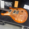 PRS Paul Reed Smith electric guitar with flame maple top in open hard case with accessories and documentation