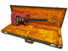 Fender Stratocaster electric guitar in Fiesta Red finish with tortoise pickguard and maple neck inside vintage Fender brown hard case with orange plush interior