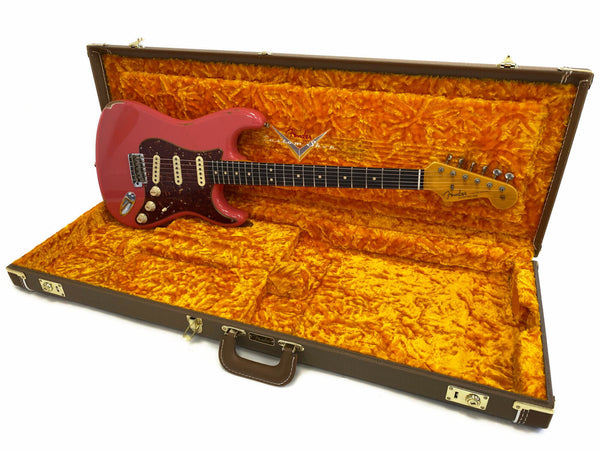 Fender Stratocaster electric guitar in Fiesta Red finish with tortoise pickguard and maple neck inside vintage Fender brown hard case with orange plush interior