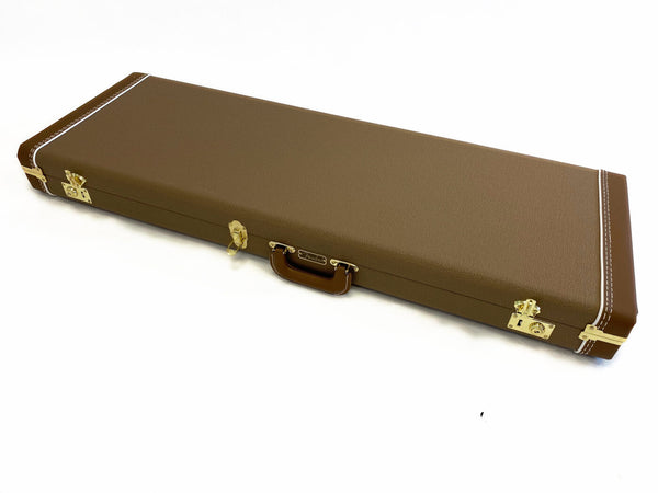 Fender brown rectangular hard guitar case with gold latches and leather handle on white background