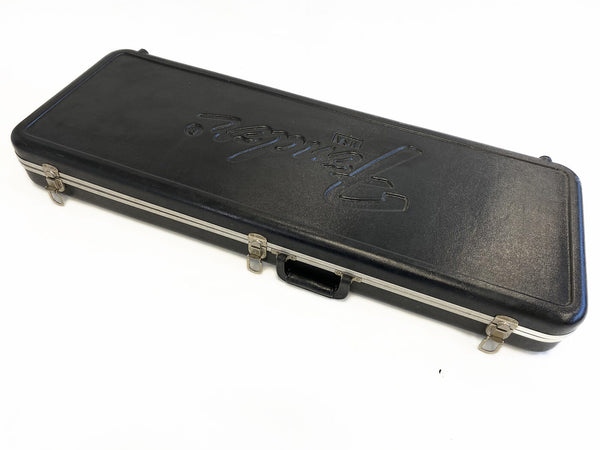 Black Fender guitar hard case with silver metal latches and handle for electric guitars, rectangular shape, white background