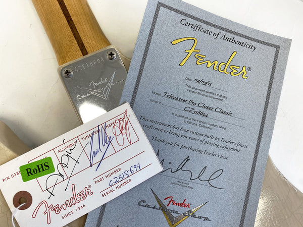 Fender Custom Shop Telecaster Pro Closet Classic guitar neck plate with serial number CZ518694, Fender Certificate of Authenticity dated 04/05/11, and Fender inspection tag with signatures and RoHS label