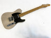 Vintage Fender Telecaster electric guitar with cracked cream finish and maple neck on white background