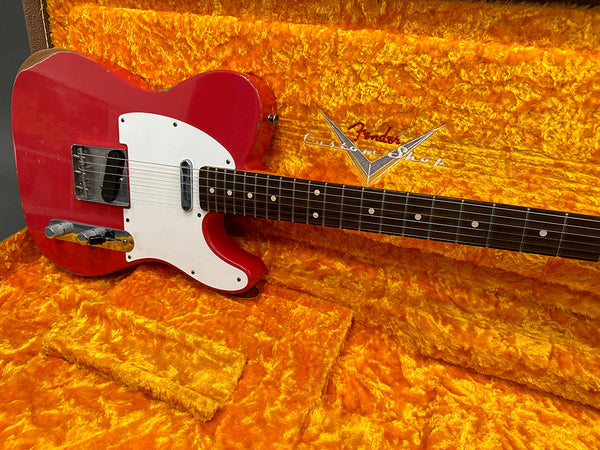 Red Fender Telecaster electric guitar with white pickguard in orange plush Fender Custom Shop case