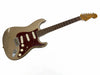 Vintage Fender Stratocaster electric guitar with worn brown body, tortoiseshell pickguard, and rosewood fretboard against white background