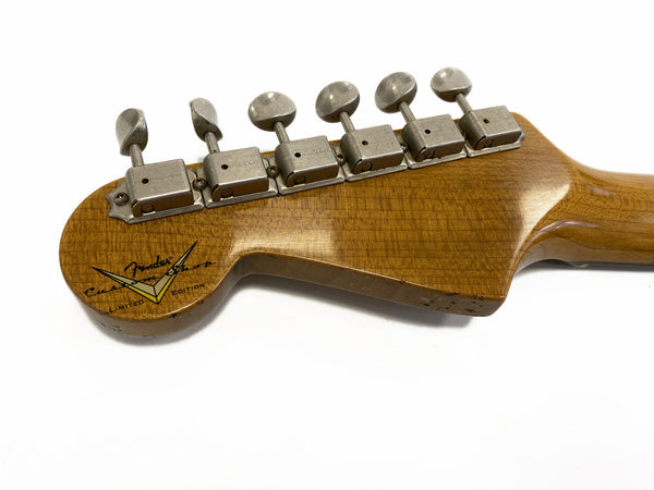 Close-up of vintage Fender Custom Shop Limited Edition guitar headstock with six tuning pegs on maple neck