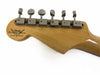 Fender Custom Shop Limited Edition guitar headstock with six vintage tuning pegs on natural wood finish