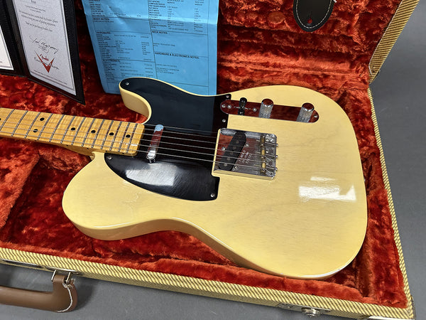 Vintage cream Fender Telecaster electric guitar with maple neck and black pickguard in orange plush lined tweed hard case with certificate of authenticity and setup sheet