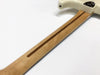 Maple guitar neck with a walnut skunk stripe and white guitar body visible on a plain white background