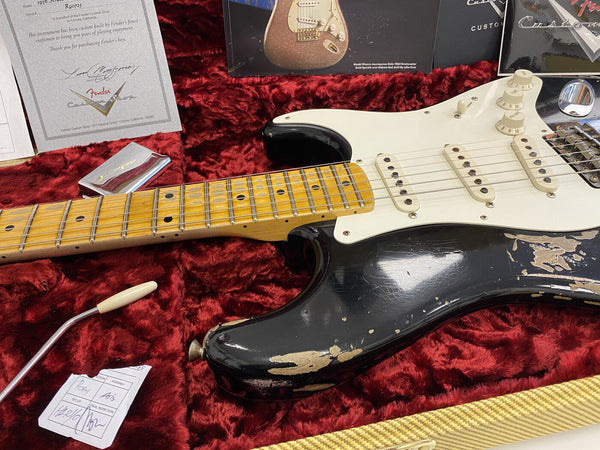 Fender Custom Shop 1956 Stratocaster electric guitar with worn black finish and maple neck in red plush-lined case with certification and tremolo arm