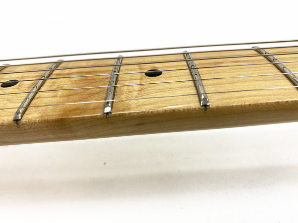 Close-up of maple guitar fretboard with metal frets and black dot inlay, electric guitar neck detail from Coffee House Guitars product listing