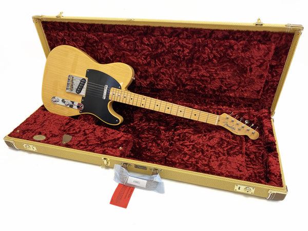Fender Telecaster electric guitar with natural wood finish and black pickguard in vintage tweed hard case with red plush interior lining