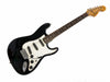 Black Fender Stratocaster electric guitar with white pickguard and rosewood fretboard isolated on white background