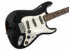 Black electric guitar with white pickguard and three EMG single-coil pickups, volume and tone control knobs, and tremolo bridge system on white background