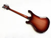 Back view of a sunburst finish electric bass guitar with chrome tuning pegs on white background