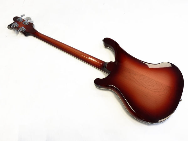 Back view of a sunburst finish electric bass guitar with chrome tuning pegs on white background
