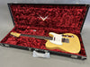 Vintage Fender Telecaster electric guitar in natural finish with white pickguard in black hardshell case lined with red plush interior