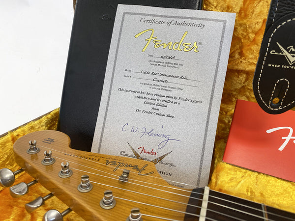 Certificate of Authenticity for Fender LTD 60 Reard Stratocaster Relic guitar in guitar case with Fender headstock and strap visible