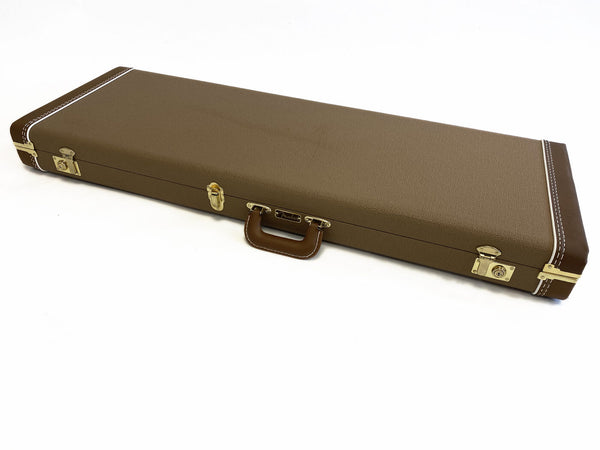 Brown Fender hardshell guitar case with leather handle and metal latches on white background