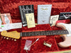 1962 Fender Stratocaster NOS guitar with original Fender manuals, certificate of authenticity, tremolo springs instruction, and accessories in red plush guitar case
