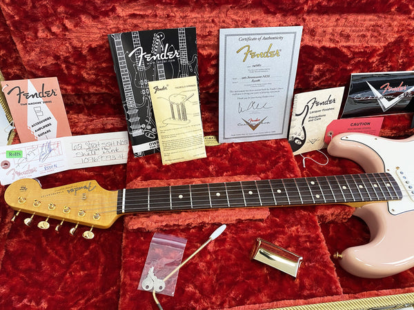 1962 Fender Stratocaster NOS guitar with original Fender manuals, certificate of authenticity, tremolo springs instruction, and accessories in red plush guitar case