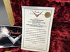 Fender Custom Shop certificate for 1959 Stratocaster Heavy Relic Faded Aged Chocolate 3TSB with specifications and sold sticker on red plush case lining.