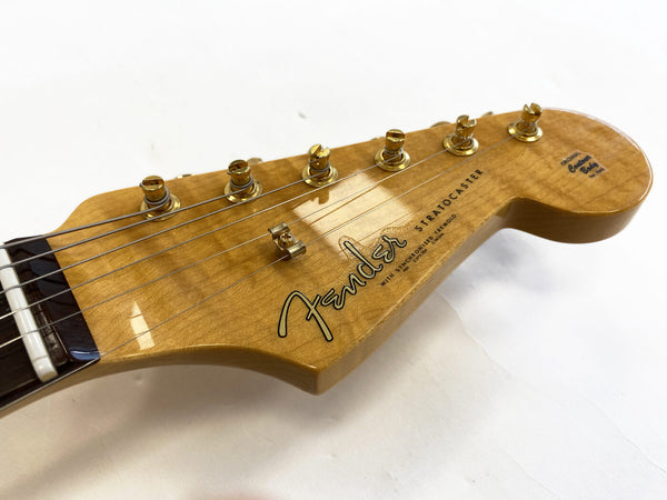 Close-up of natural wood Fender Stratocaster guitar headstock with gold tuning pegs and "Original Contour Body" decal on a white background
