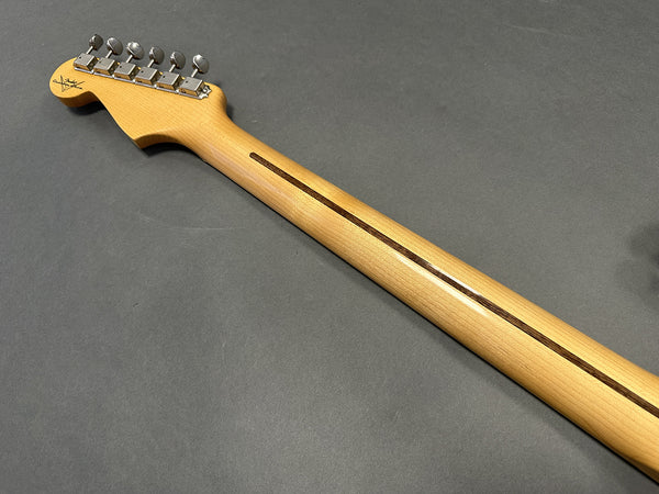 Maple guitar neck with a single-piece heel and silver tuning pegs on dark gray background, Coffee House Guitars product.
