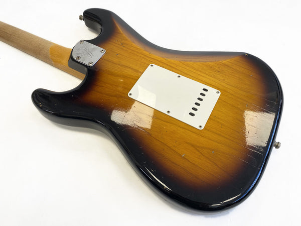 Vintage sunburst electric guitar body with aged finish and white backplate, maple neck heel with metal neck plate on white background