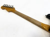 Fender electric guitar neck with six tuning pegs and worn wood finish on white background